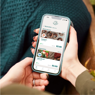 a person is holding a phone that says my location on the screen