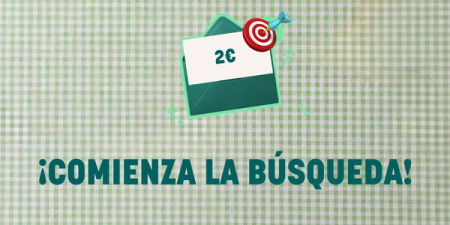 A graphic showing a green envelope with a '2€' card, a target with a dart, and the text '¡COMIENZA LA BÚSQUEDA!' (The search begins!) on a green checkered background.