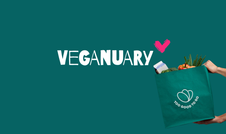 a person is holding a bag of vegetables with the words veganuary above it