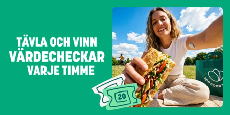 Ad with text "Compete and win gift cards every hour," showing a smiling woman holding a sandwich in a park, with a "Too Good To Go" bag and coupons.