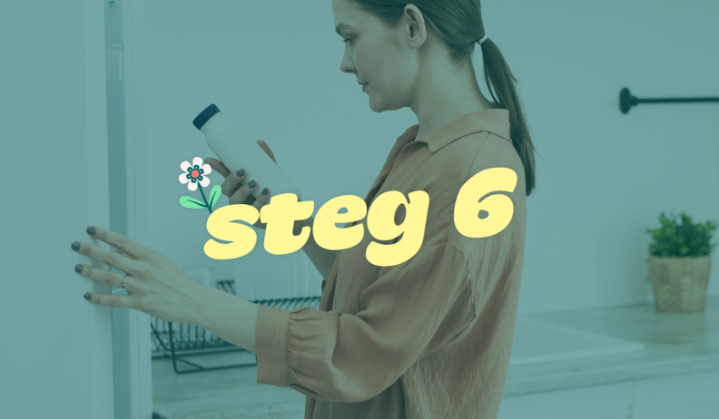 a woman is holding a bottle in front of a sign that says steg 6