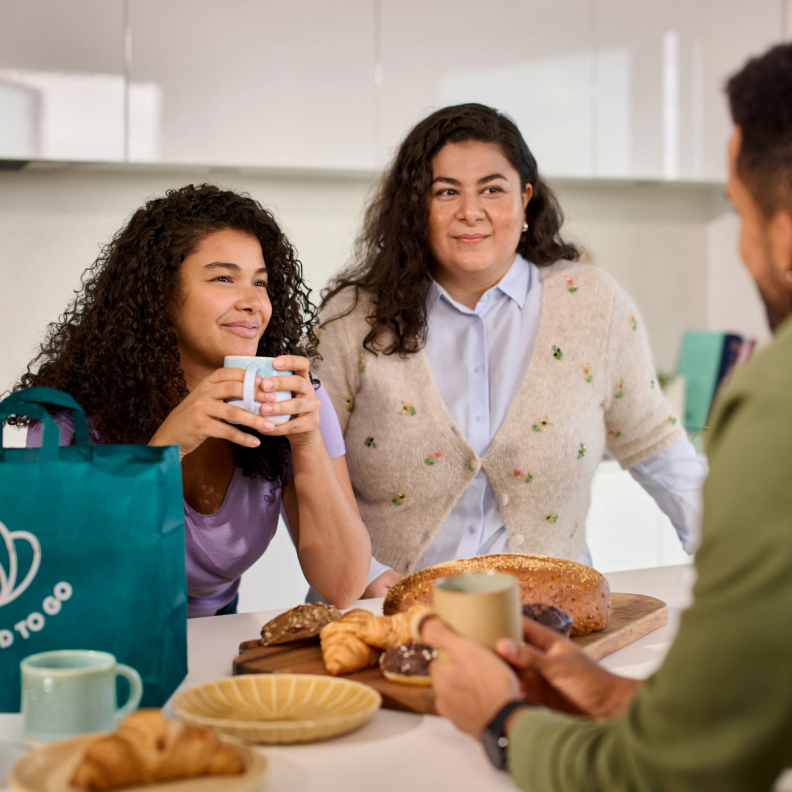 Family having tea and baked items together