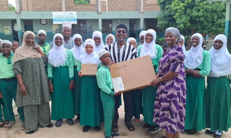Students in green uniforms at Starlink handover ceremony, Wa Upper West Region