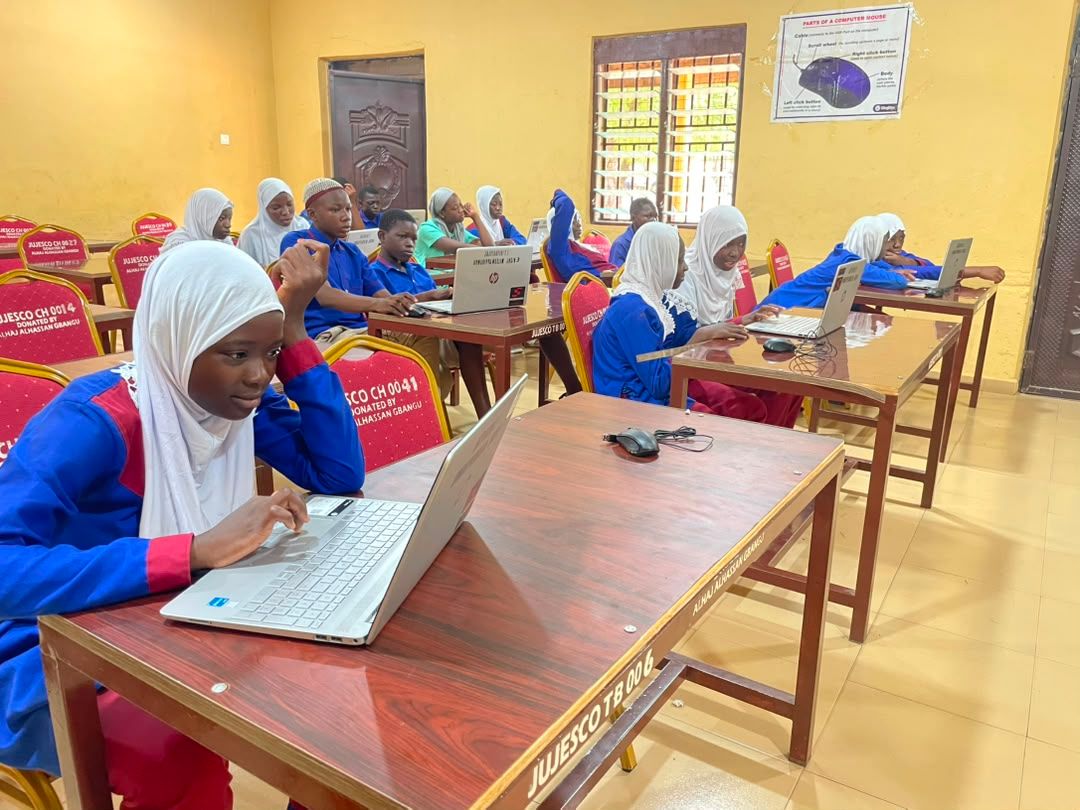 Students on laptops in newly connected computer lab, Wa Upper West Region
