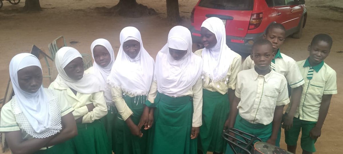 Students in hijabs at Kpongu cultural musical and sign language programme