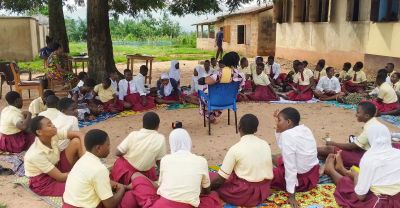 Students in a facilitated leadership circle session, Upper West Region