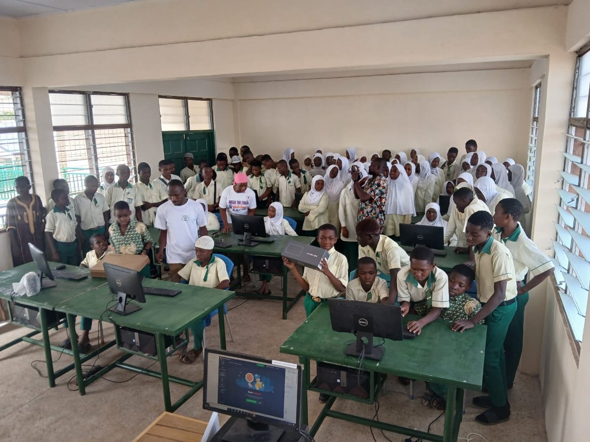 Students working on Dell computers in fully equipped school computer lab, Wa