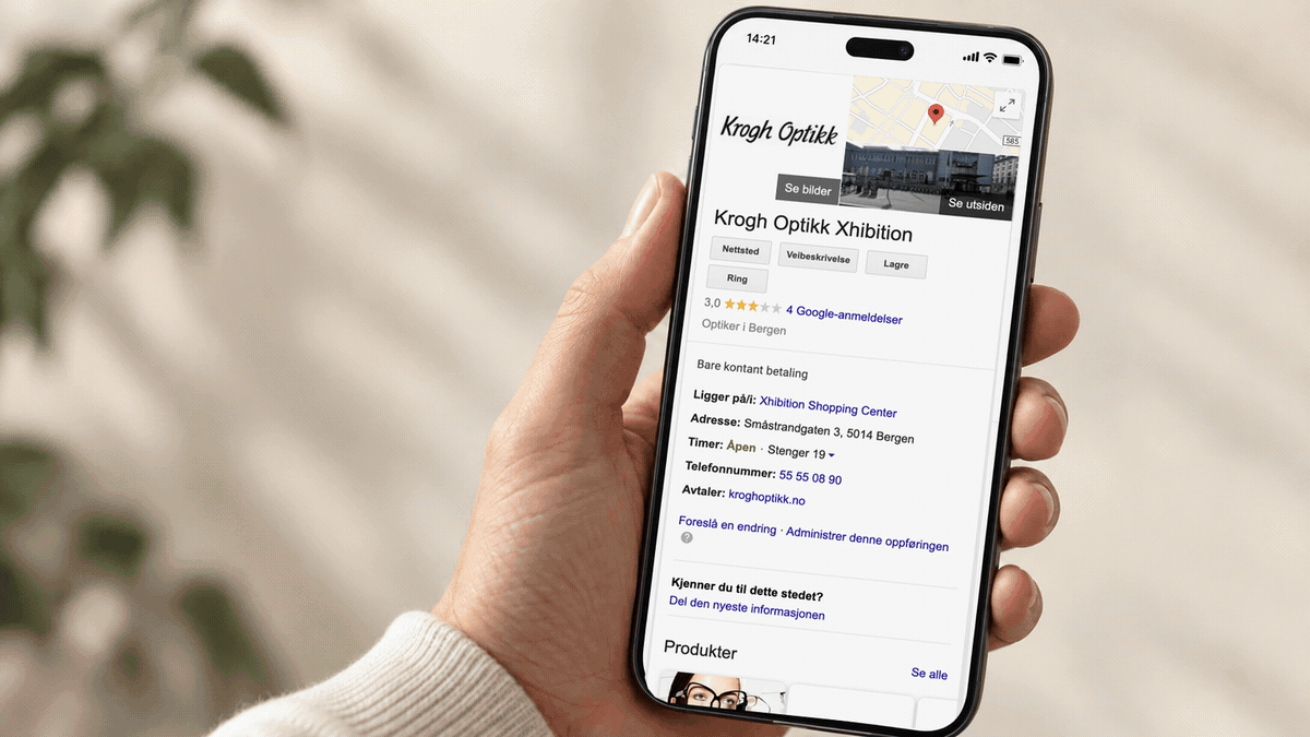 Krogh Optikks bedriftsprofil på Google, vist på en mobil