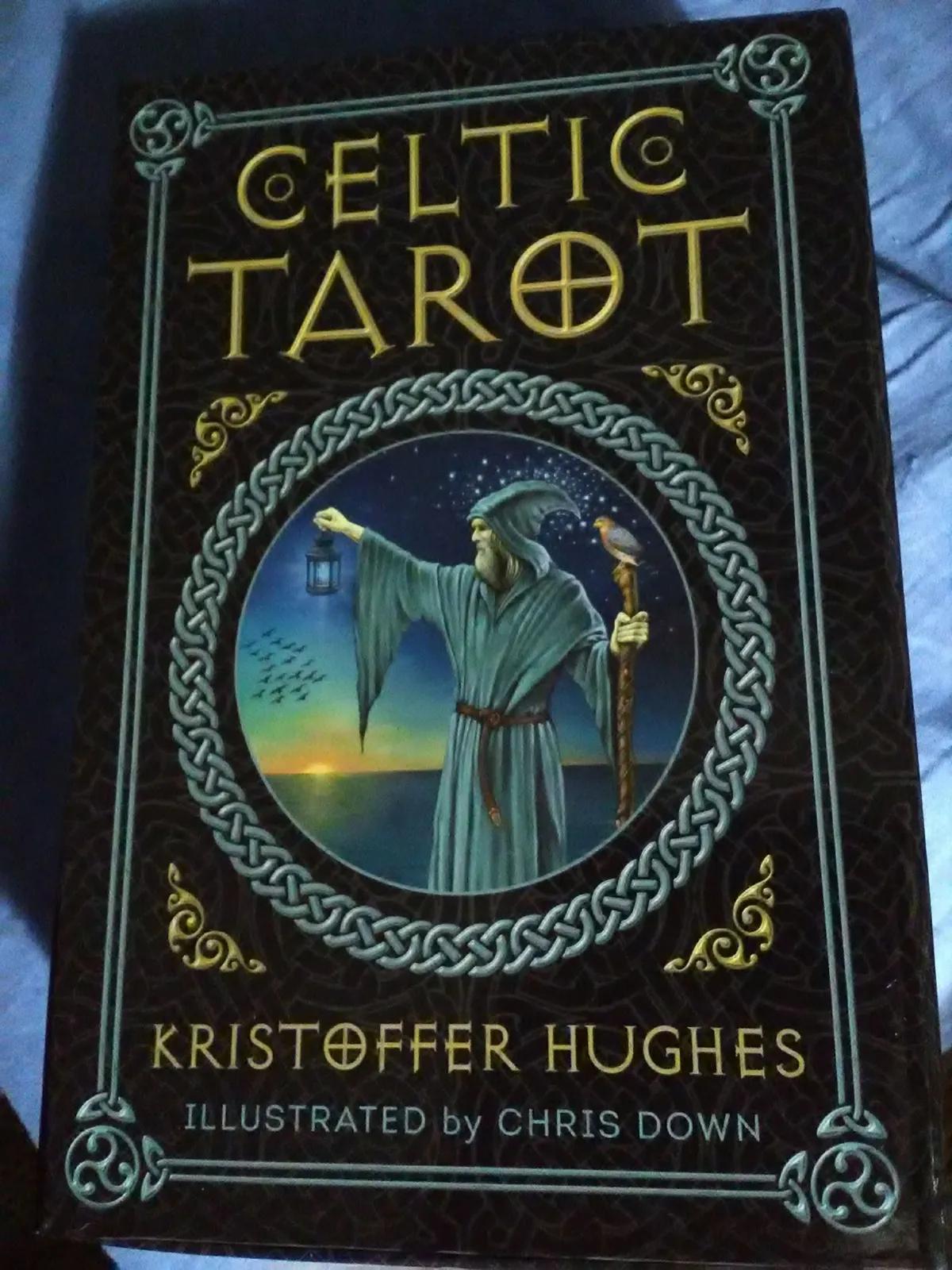 Celtic Tarot deck box decorated with knotwork and an illustrated robed reader