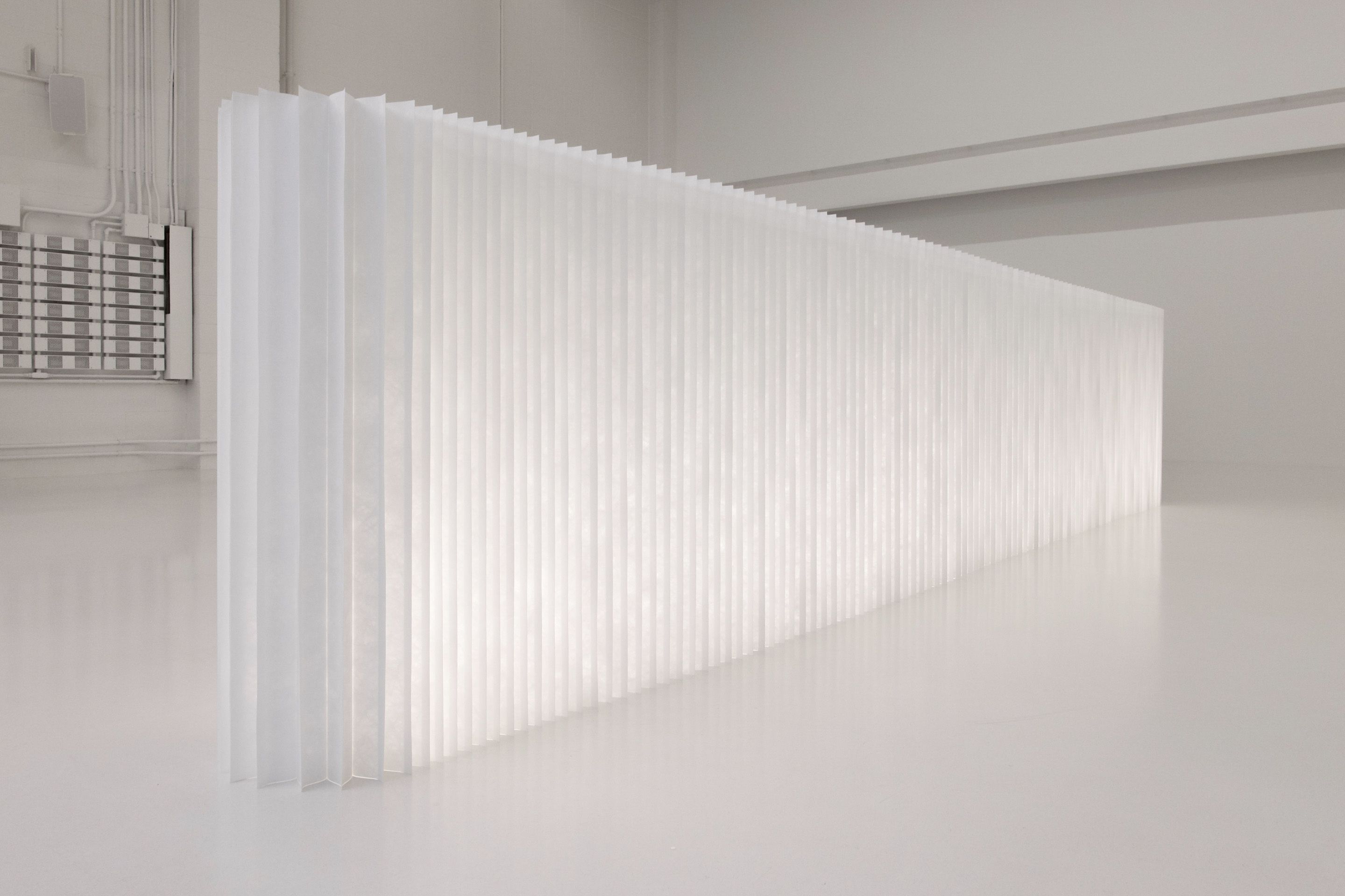 When illuminated, the translucent white textile has an ethereal quality well suited to experiential design or luxury environments.
