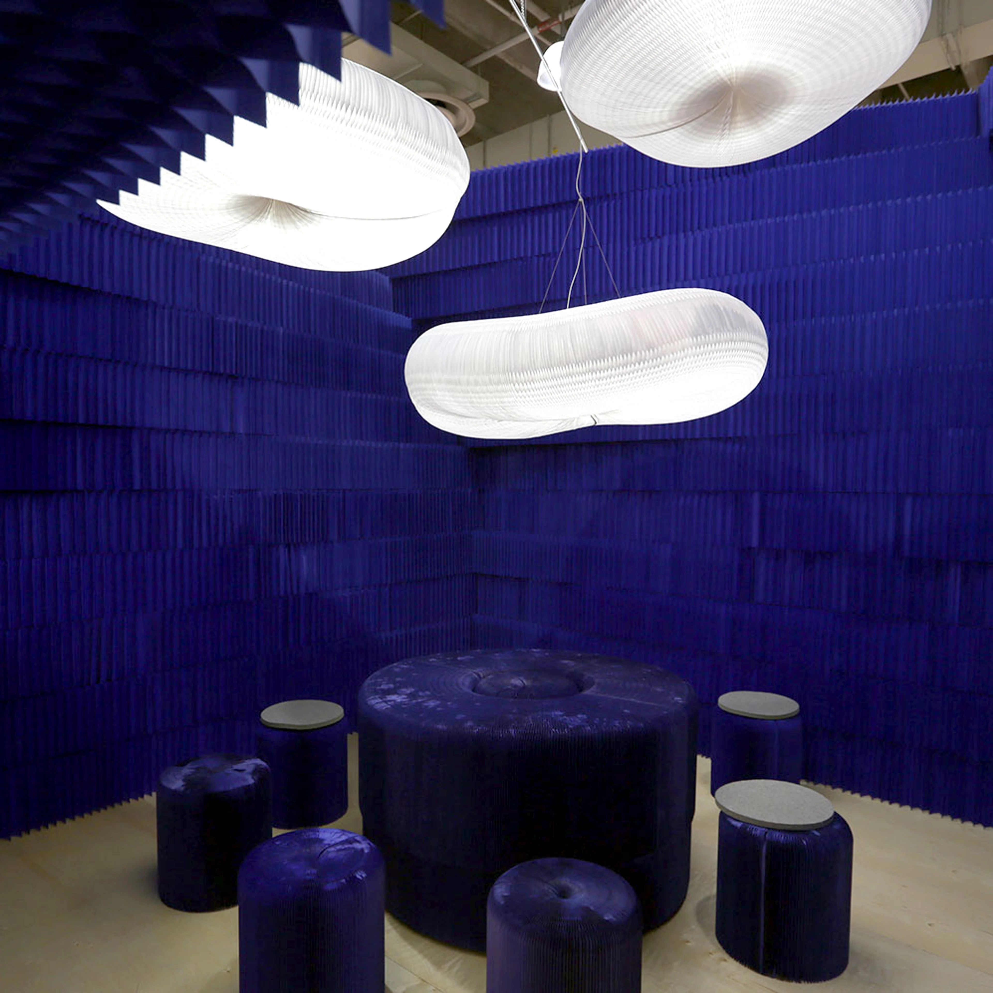 The interior of paper music for a blue room at ICFF 2012 - paper lights