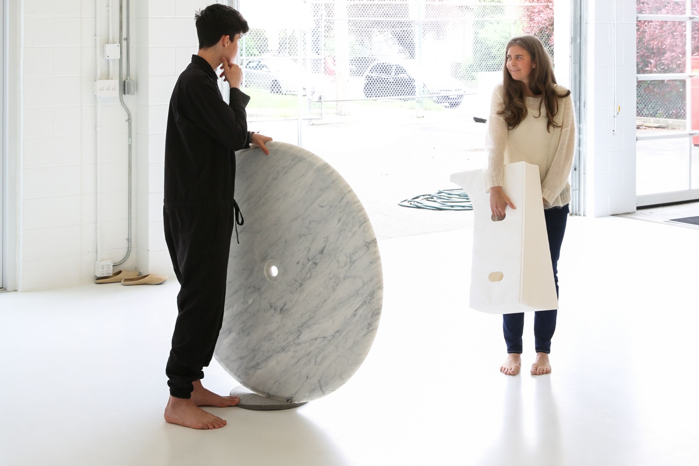 cantilever table compresses flat for easy storage and transport, returning flexible space to its surroundings.