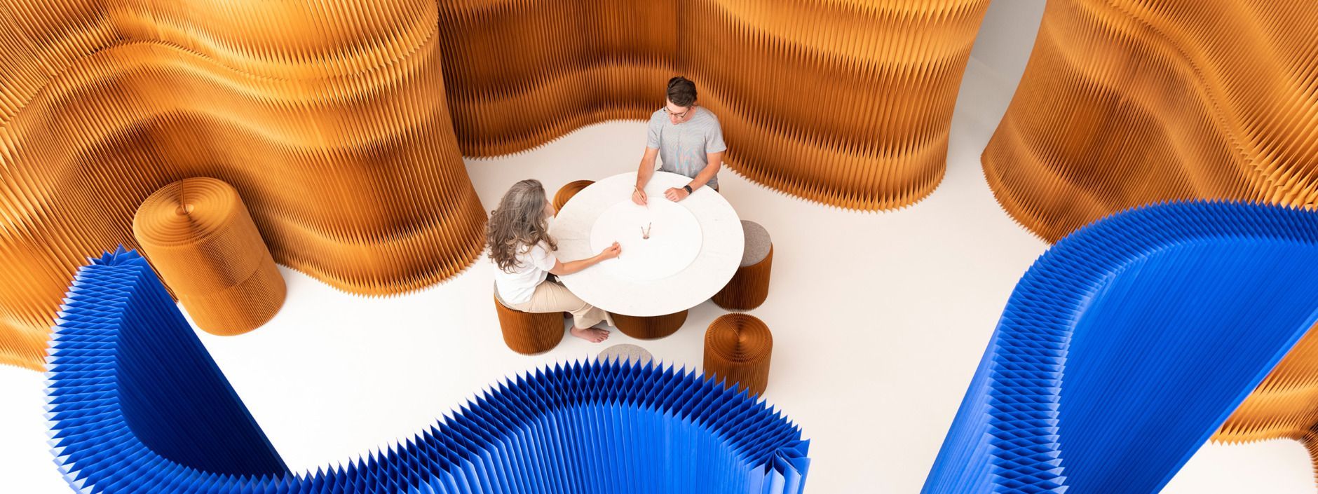 Custom carved paper softwalls - sculptural acoustic walls from above