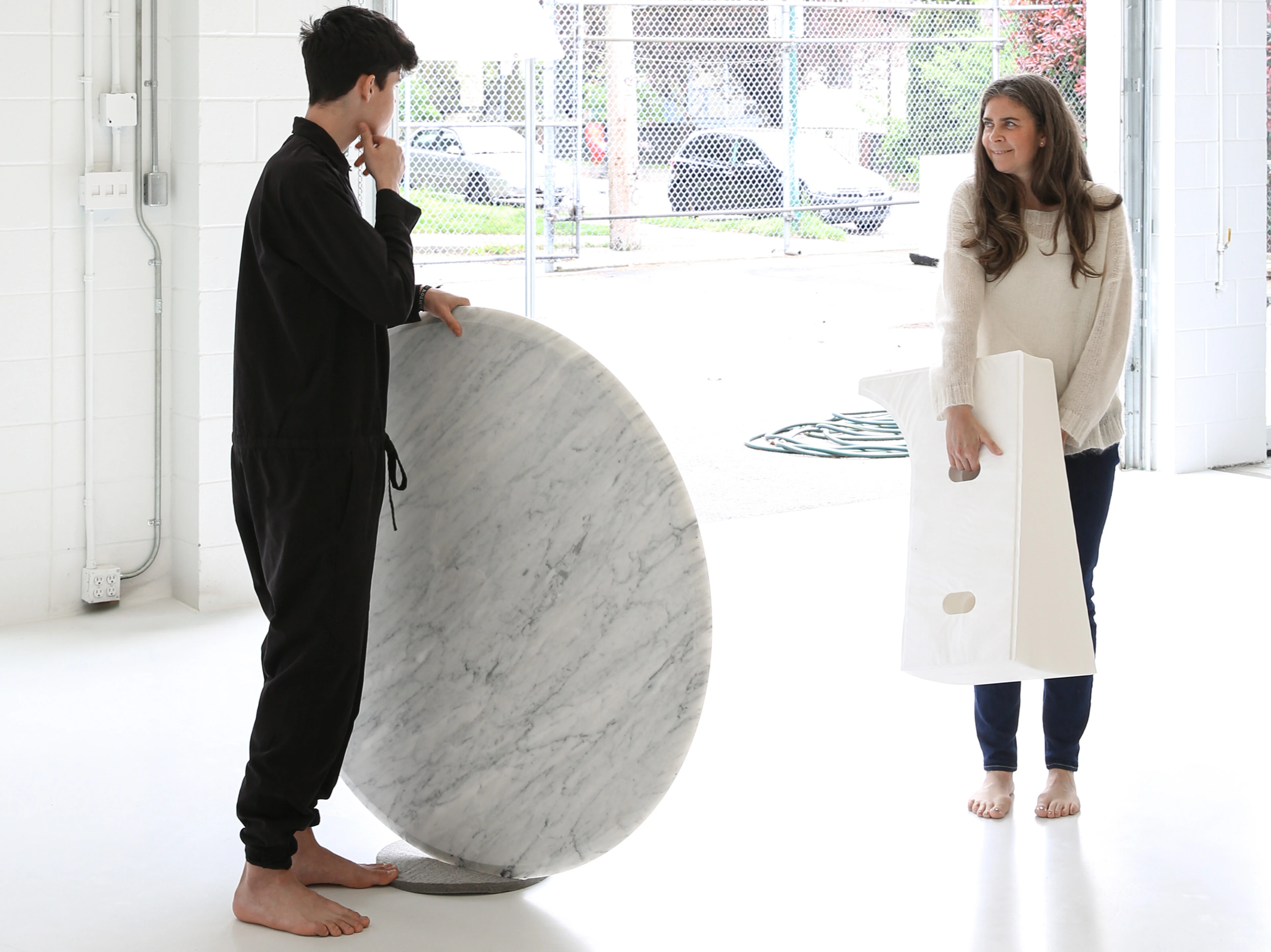 cantilever table compresses flat for easy storage and transport, returning flexible space to its surroundings.