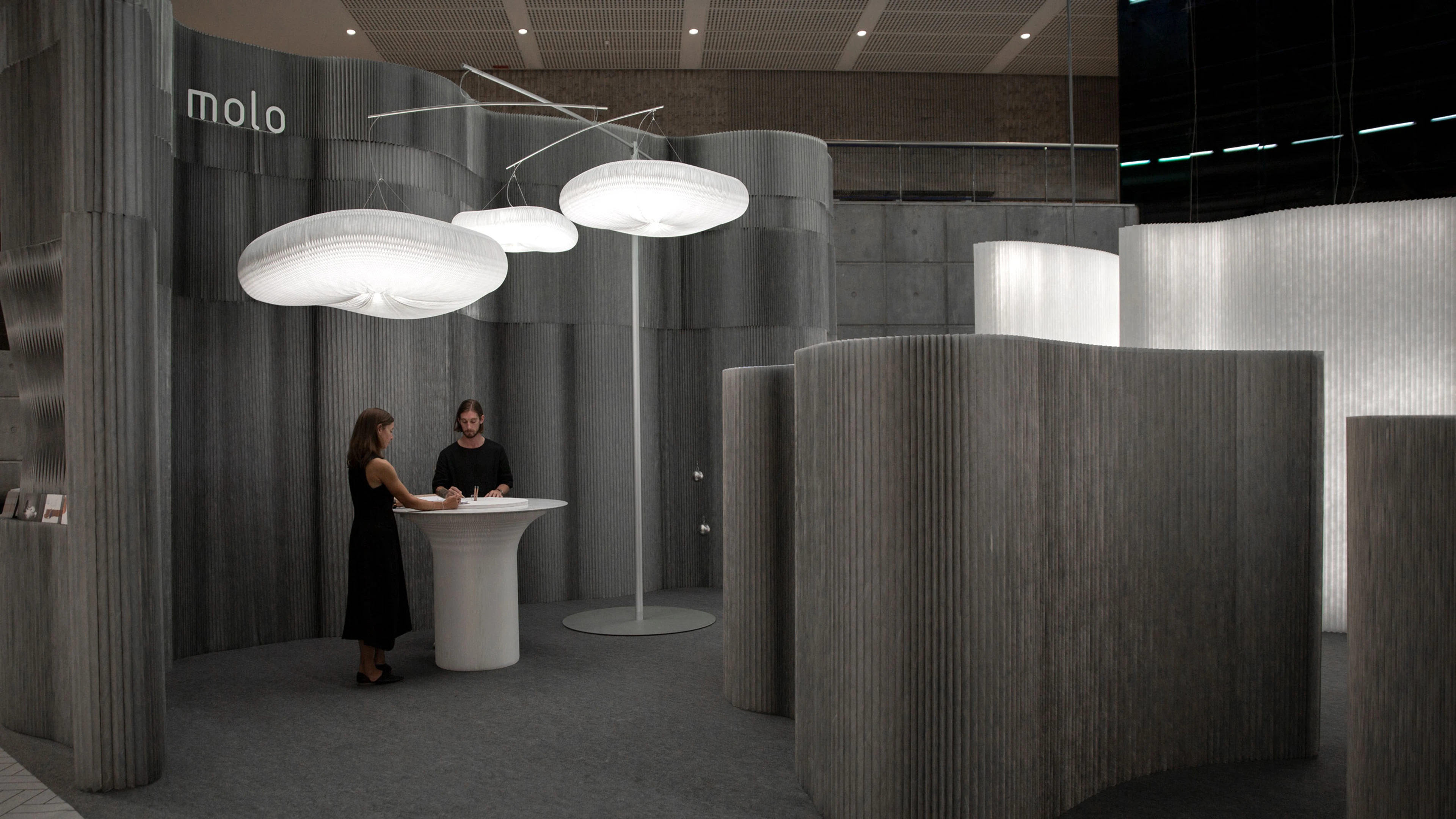 aluminum partition wall, cantilever table, cloud mast pendant lighting by molo - imm cologne 2020
