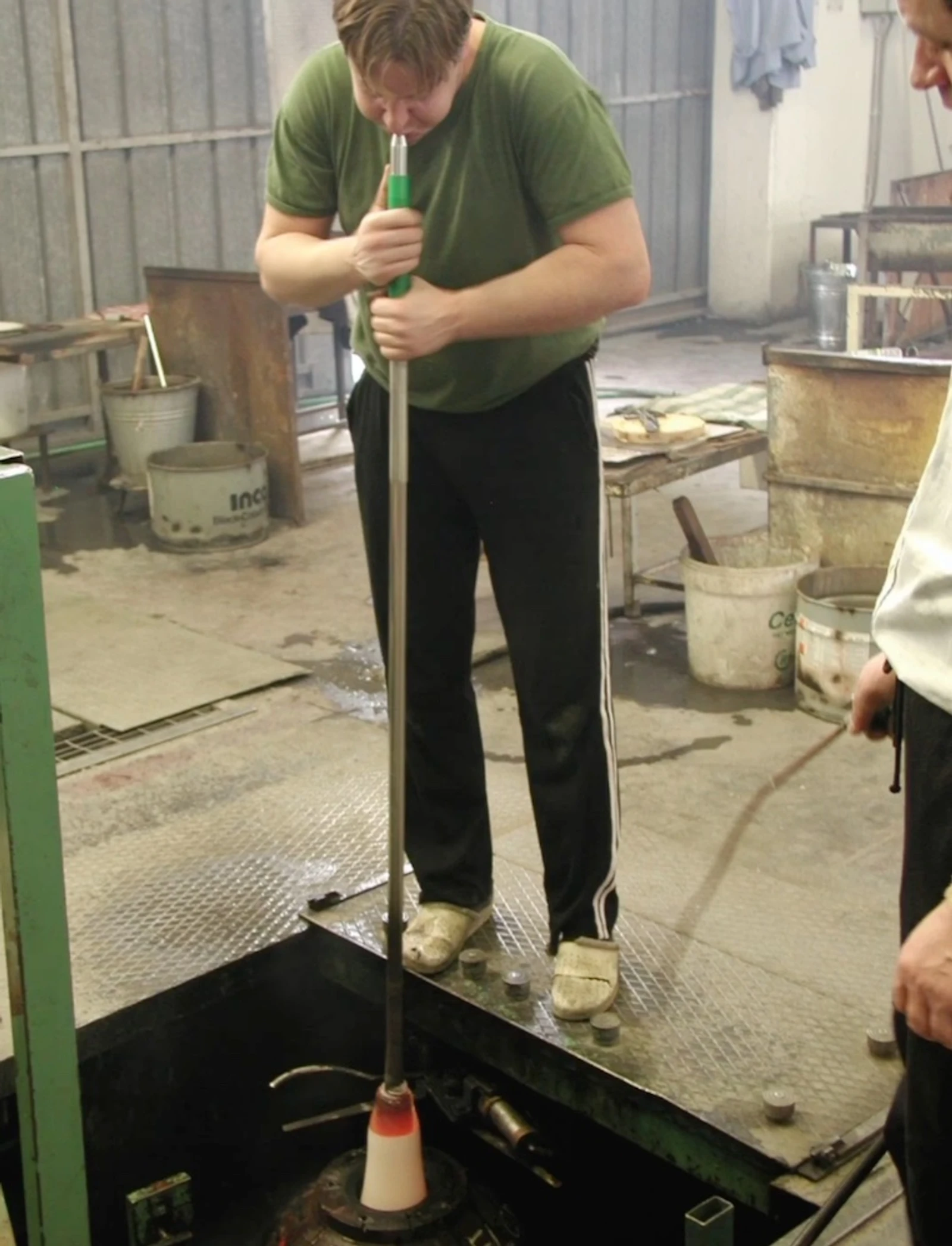 glass blower creating float teaware