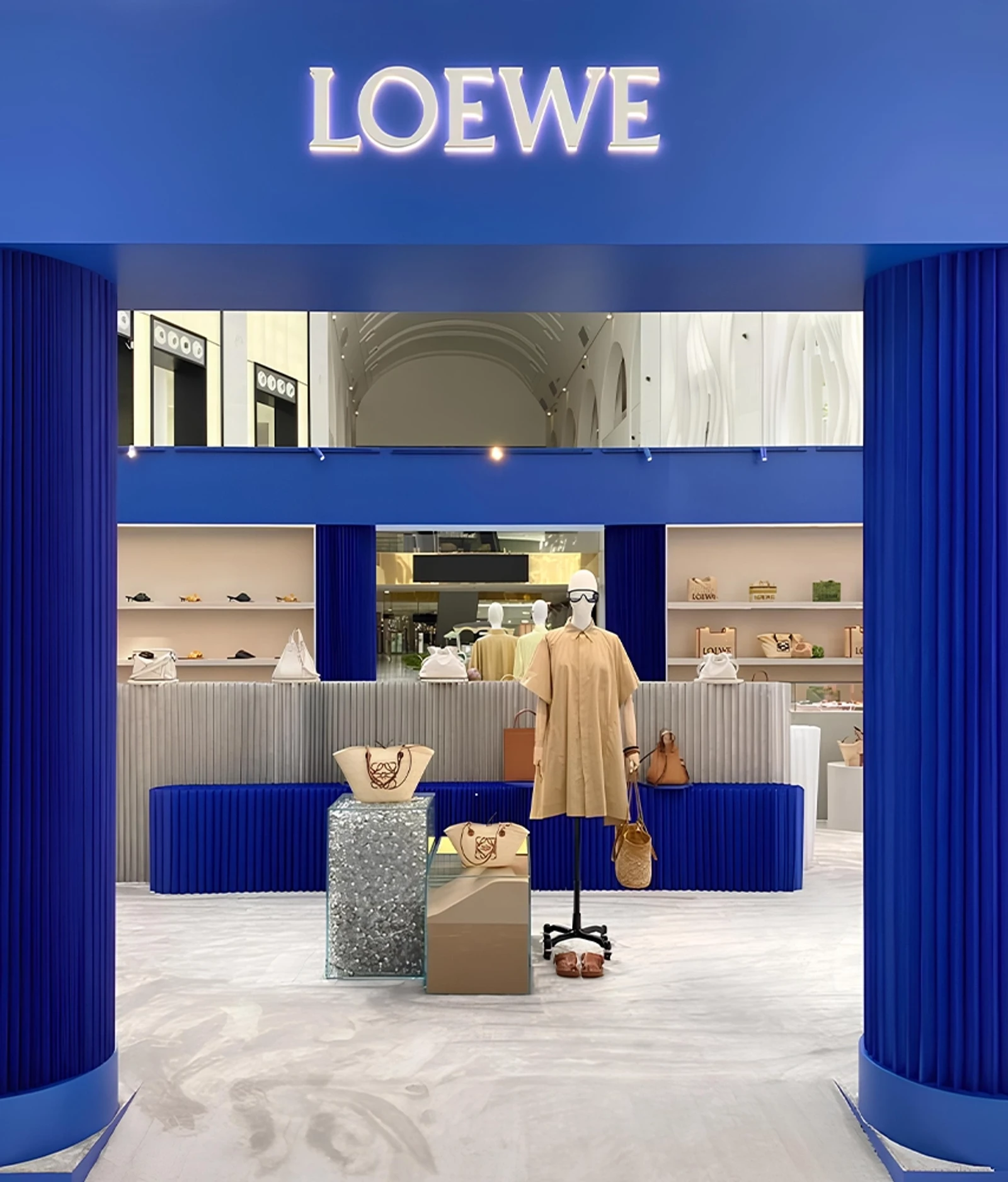 Loewe retail environment featuring blue and aluminum softblock