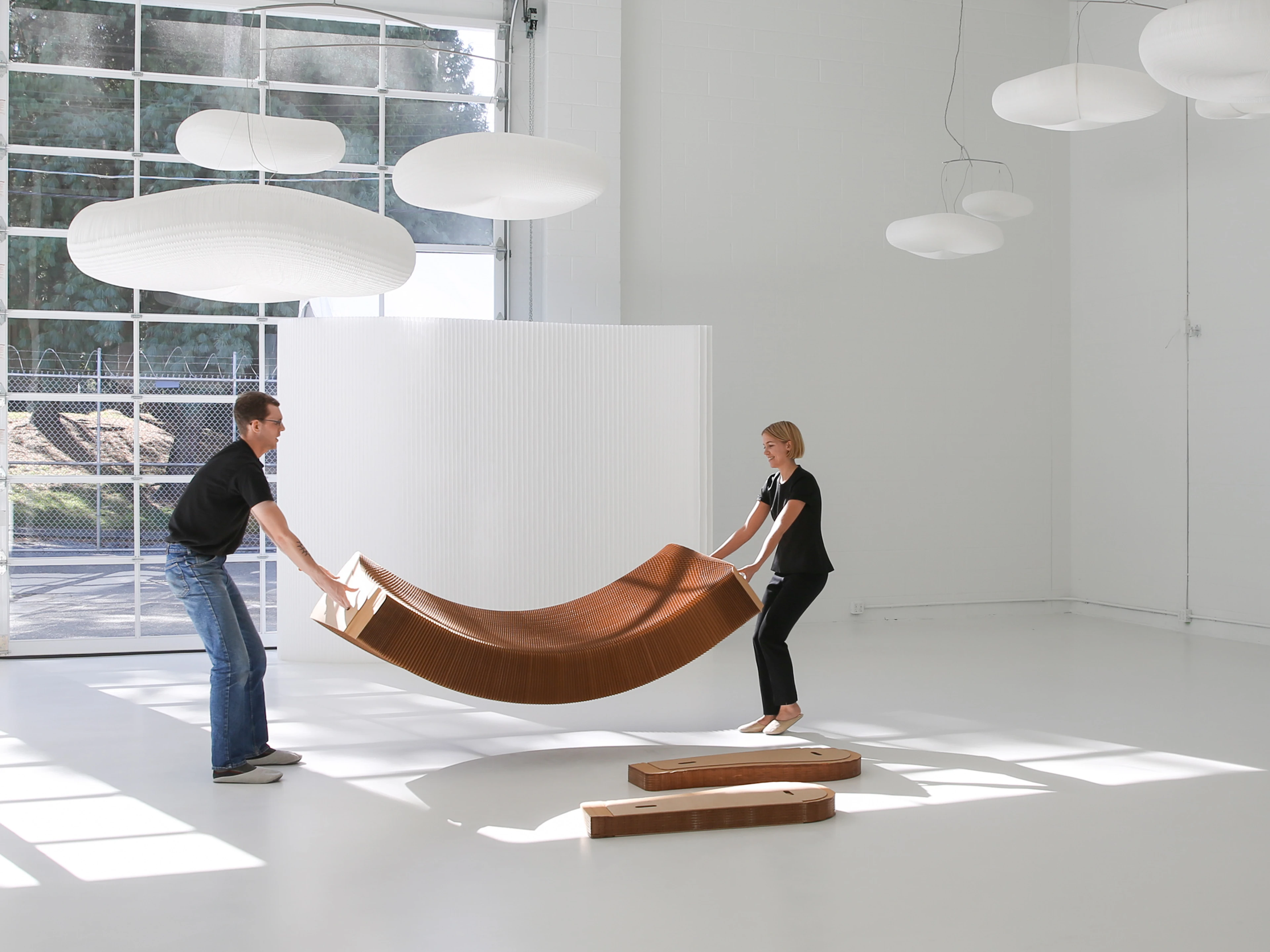 Each lounger is an element of flat-pack furniture made from three sections.
