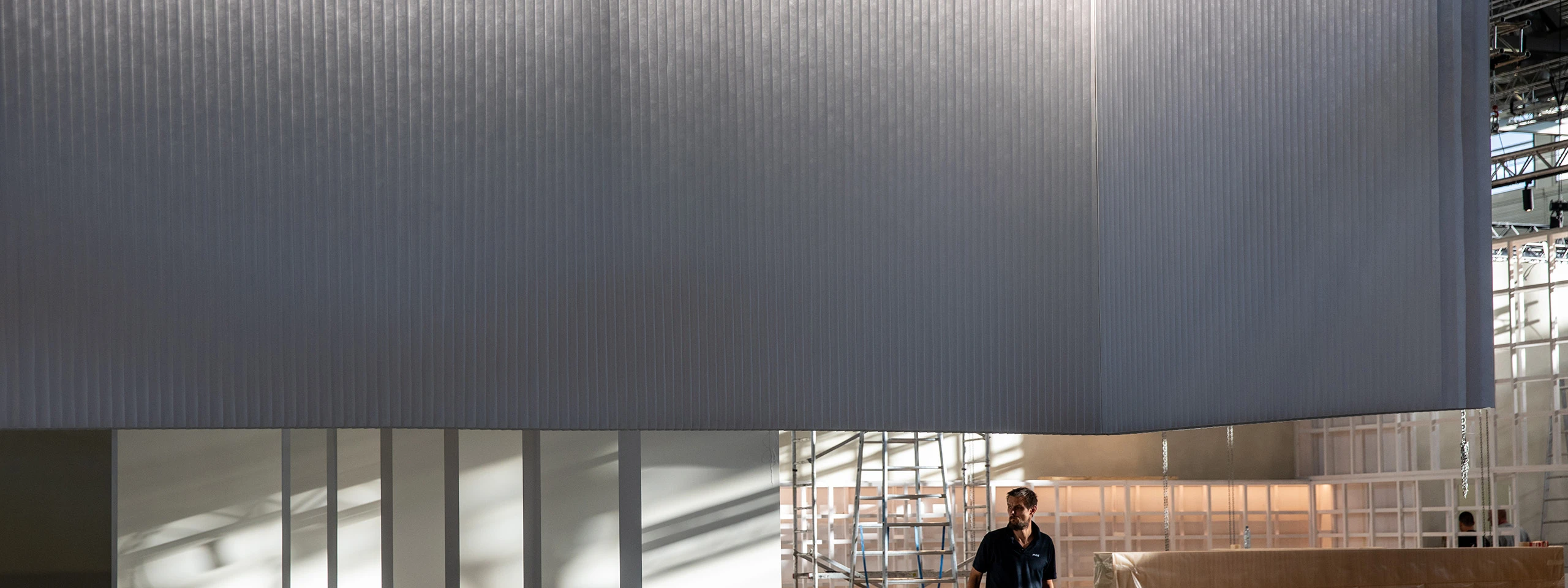 Suspended softwall luminarie interior acoustic partition