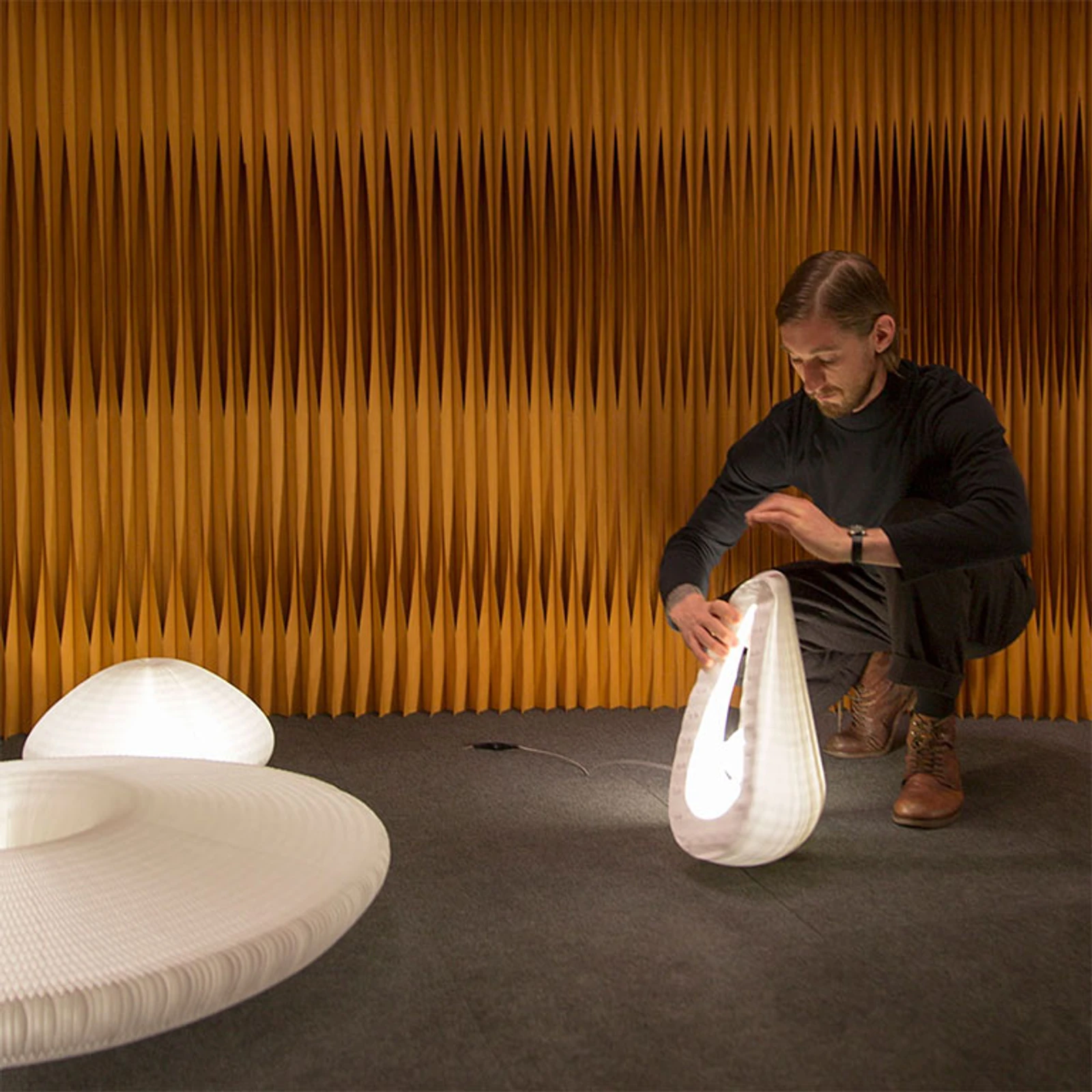 A man demonstrates urchin's flexibility at ICFF 2017.