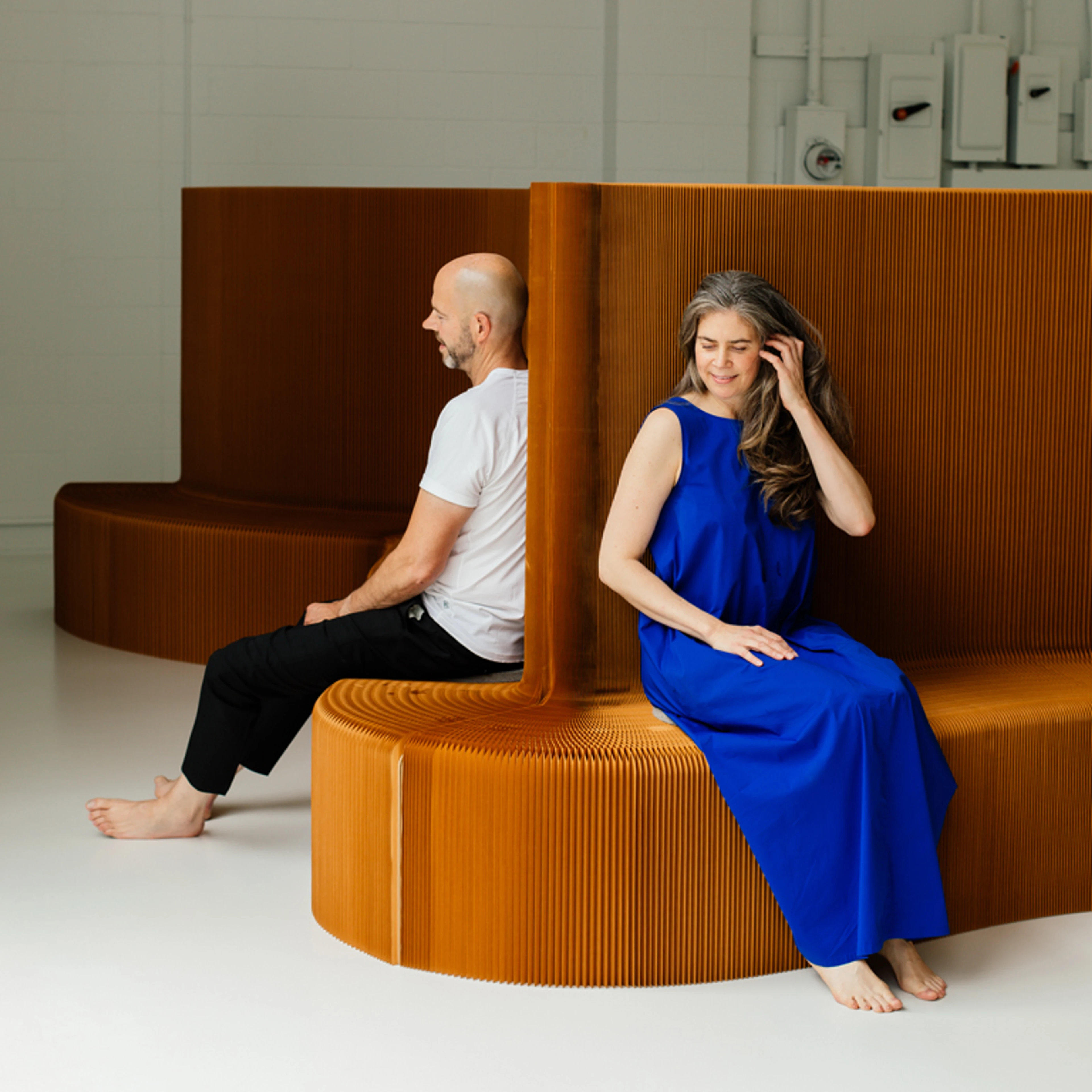 Stephanie Forsythe and Todd MacAllen, molo founders and designers, paper benchwall, molo