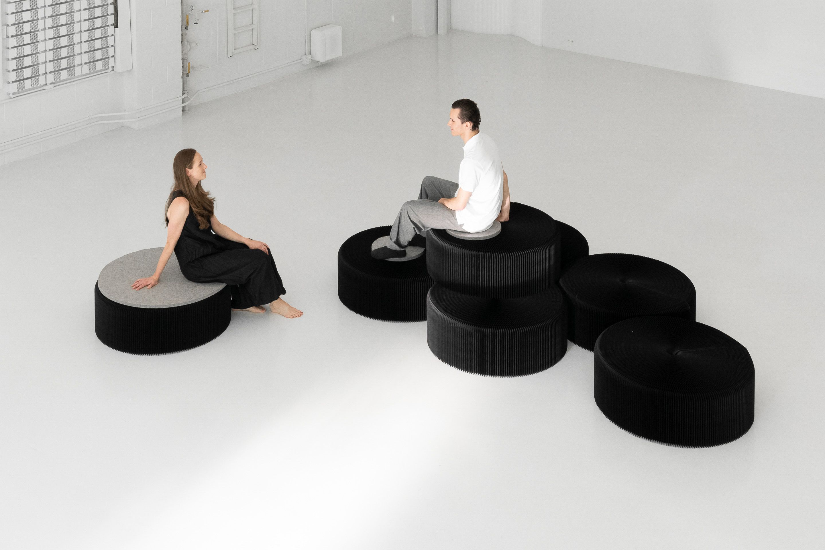 Build playful seating hills by stacking different sizes of softseating together.