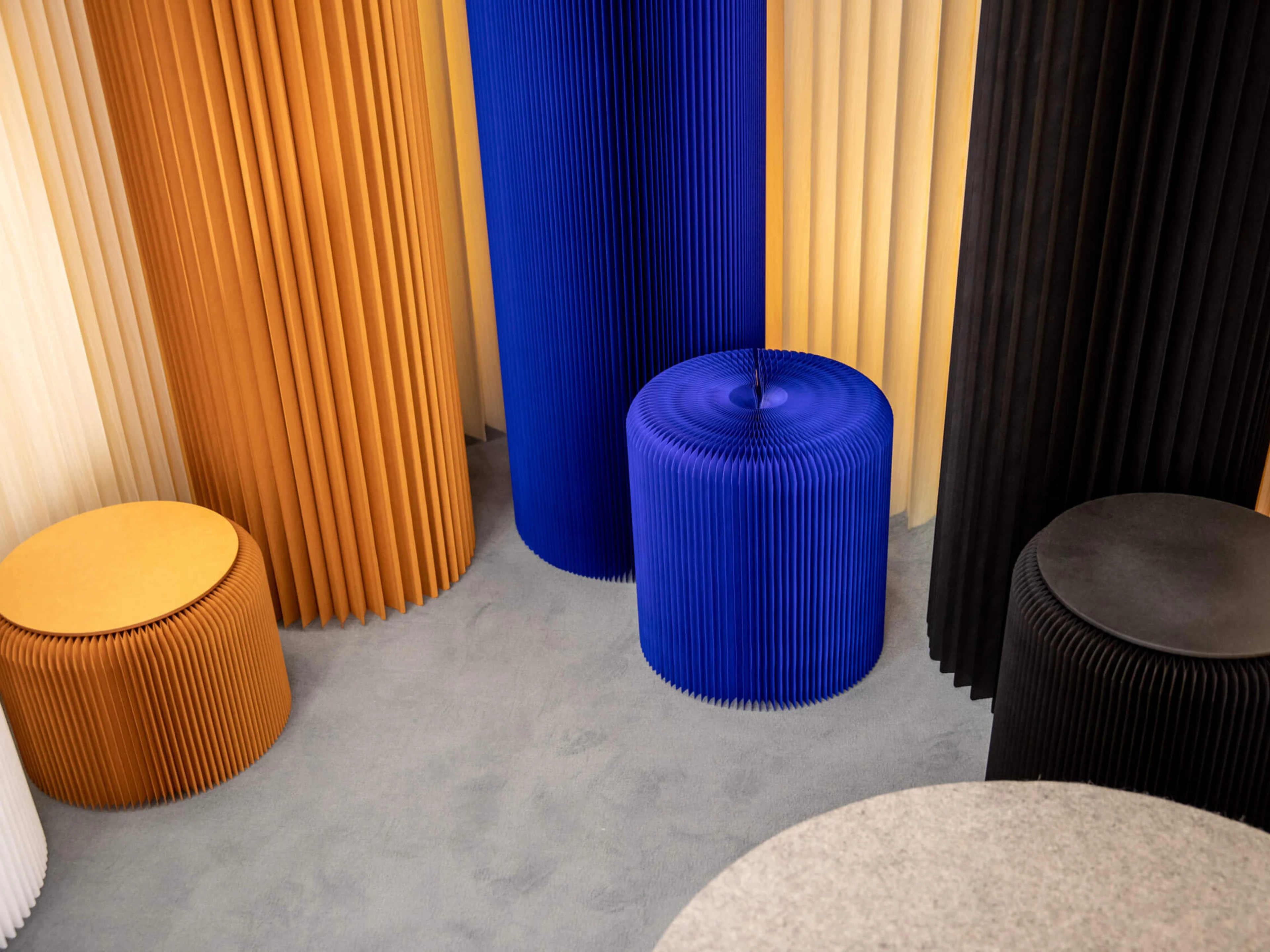 paper stools and softwalls in multiple colour options