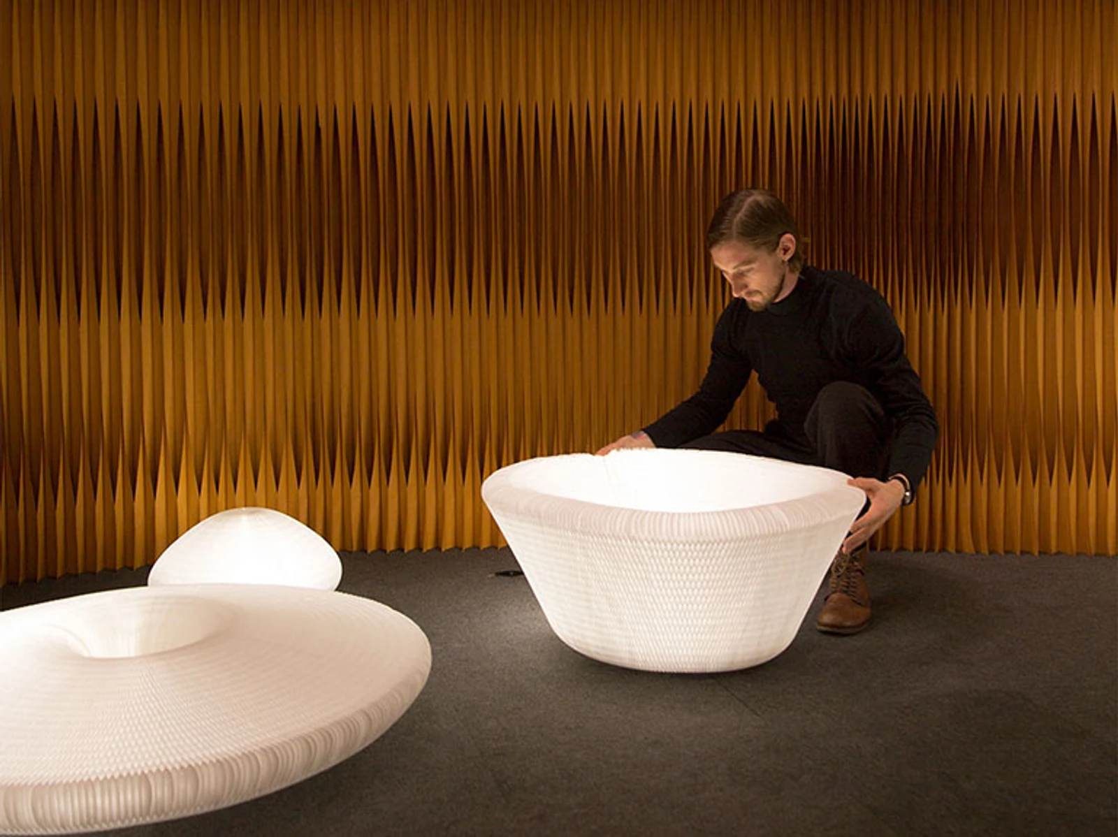 A man demonstrates urchin's flexibility at ICFF 2017.