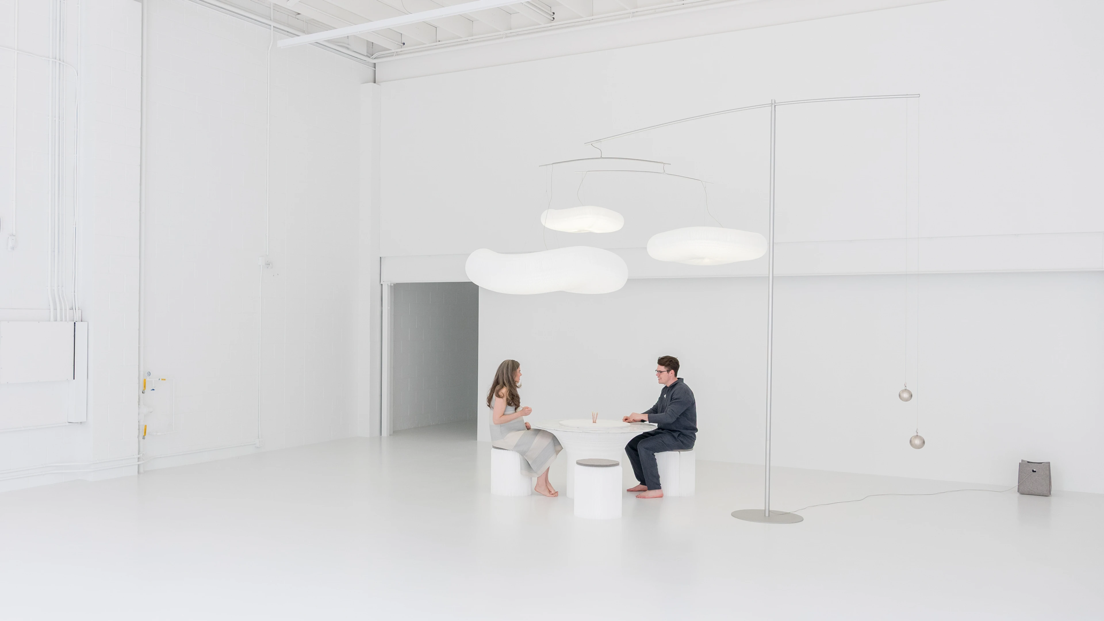 flat-pack table, round white table, cantilever table by molo, cloud lighting