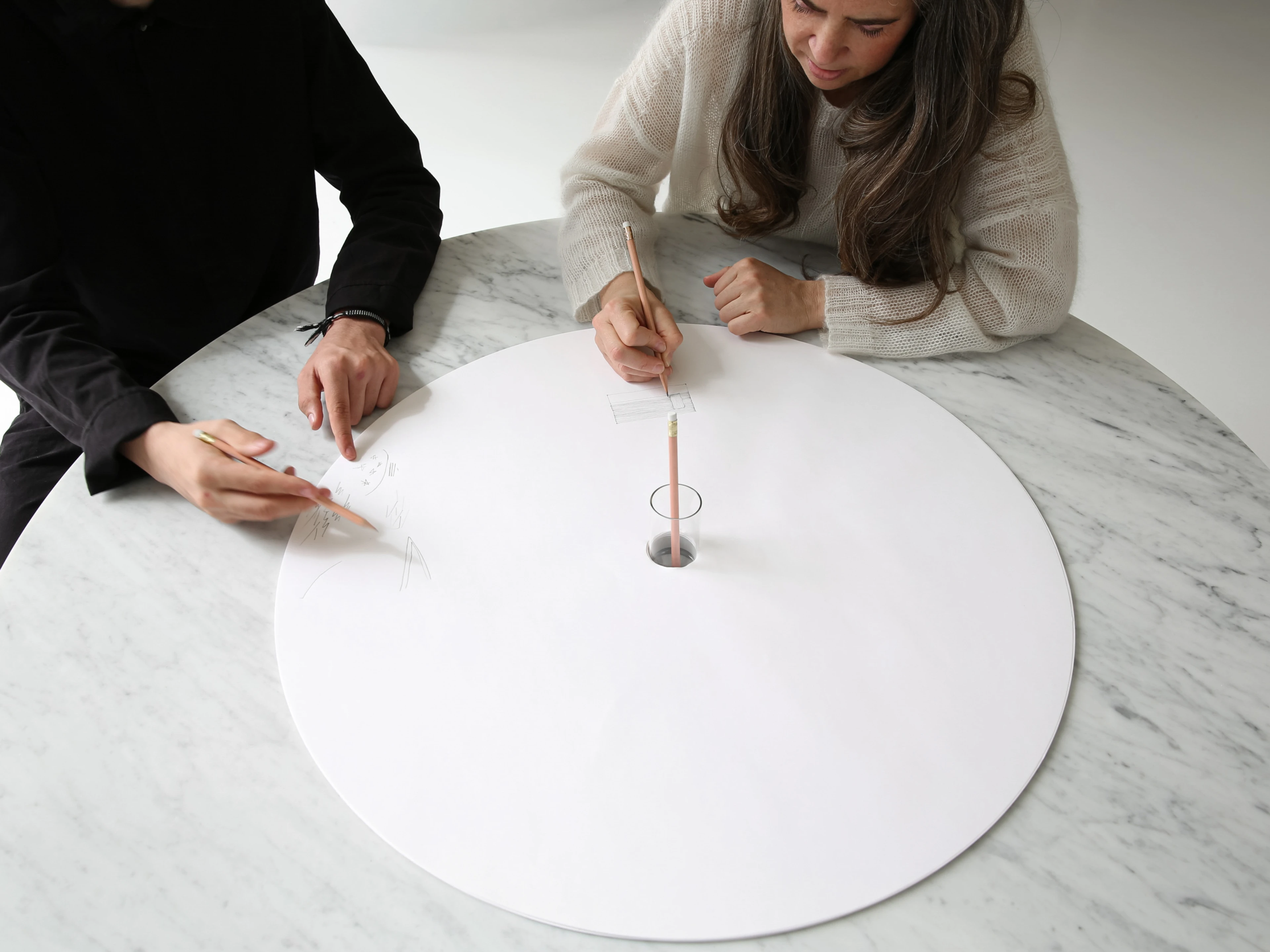 Once a sheet is covered with notes, plans, and diagrams, simply lift it from the stack and continue brainstorming below.