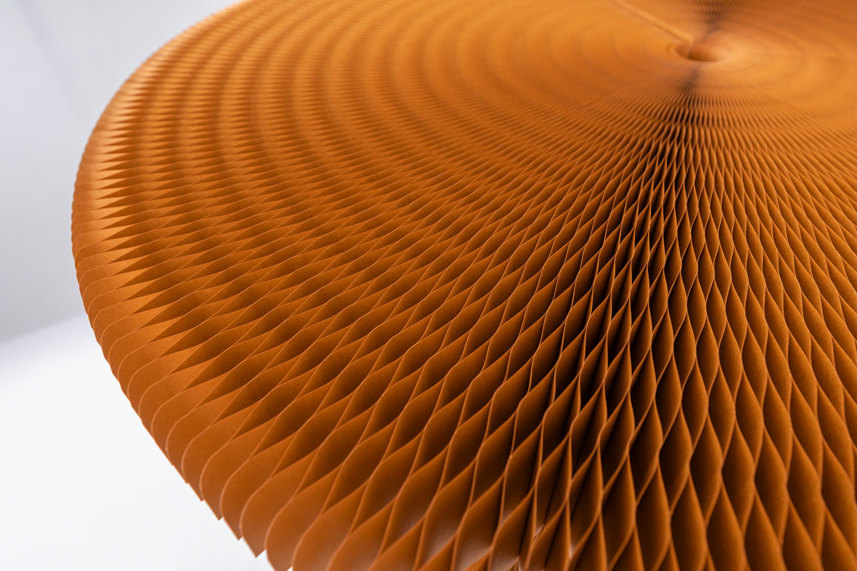 Honeycomb geometry offers the table base surprising strength, easily supporting PaperStone® or marble tops. 