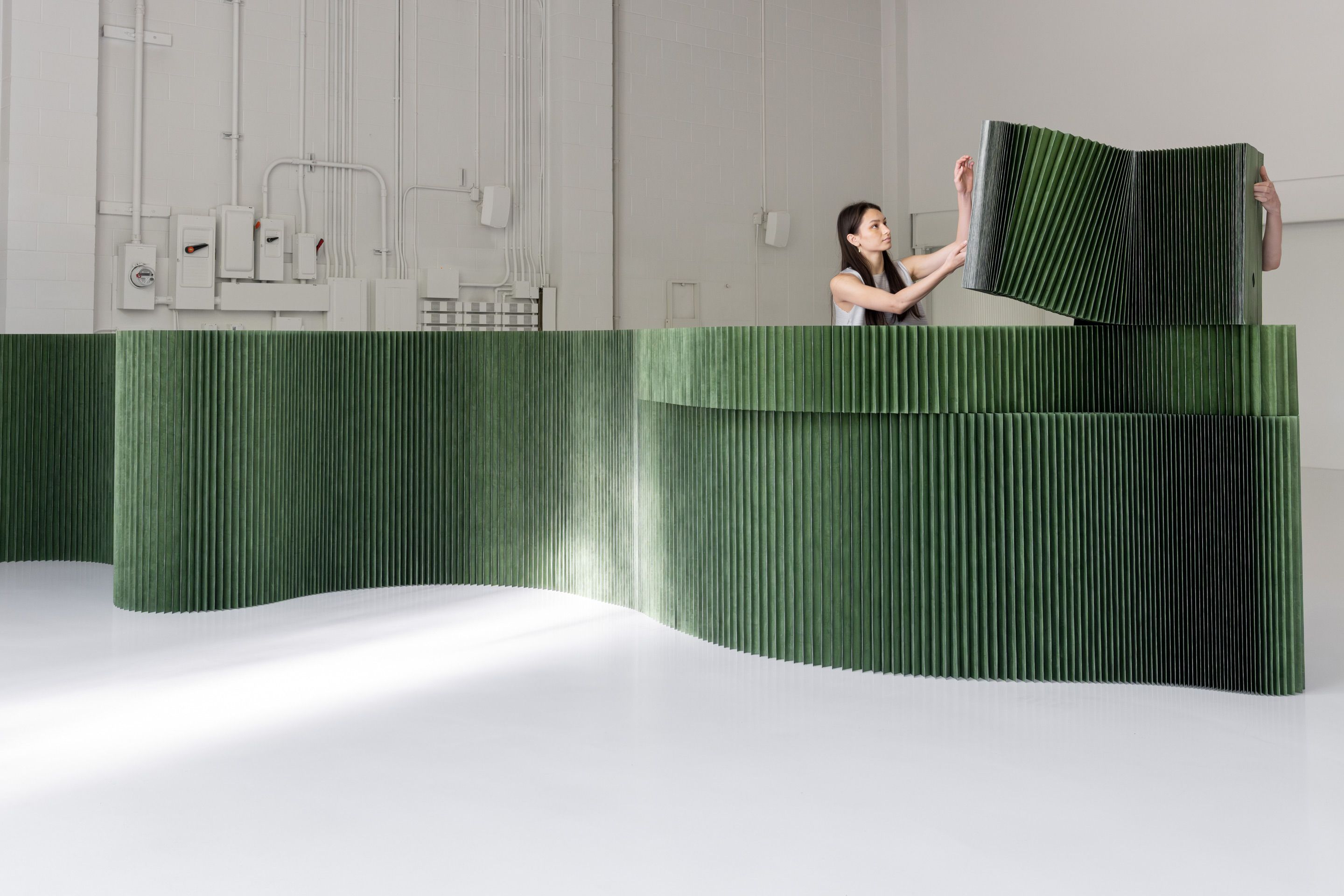 Modular magnetic end panels allow different heights to connect seamlessly, offering further potential for layering and texture.