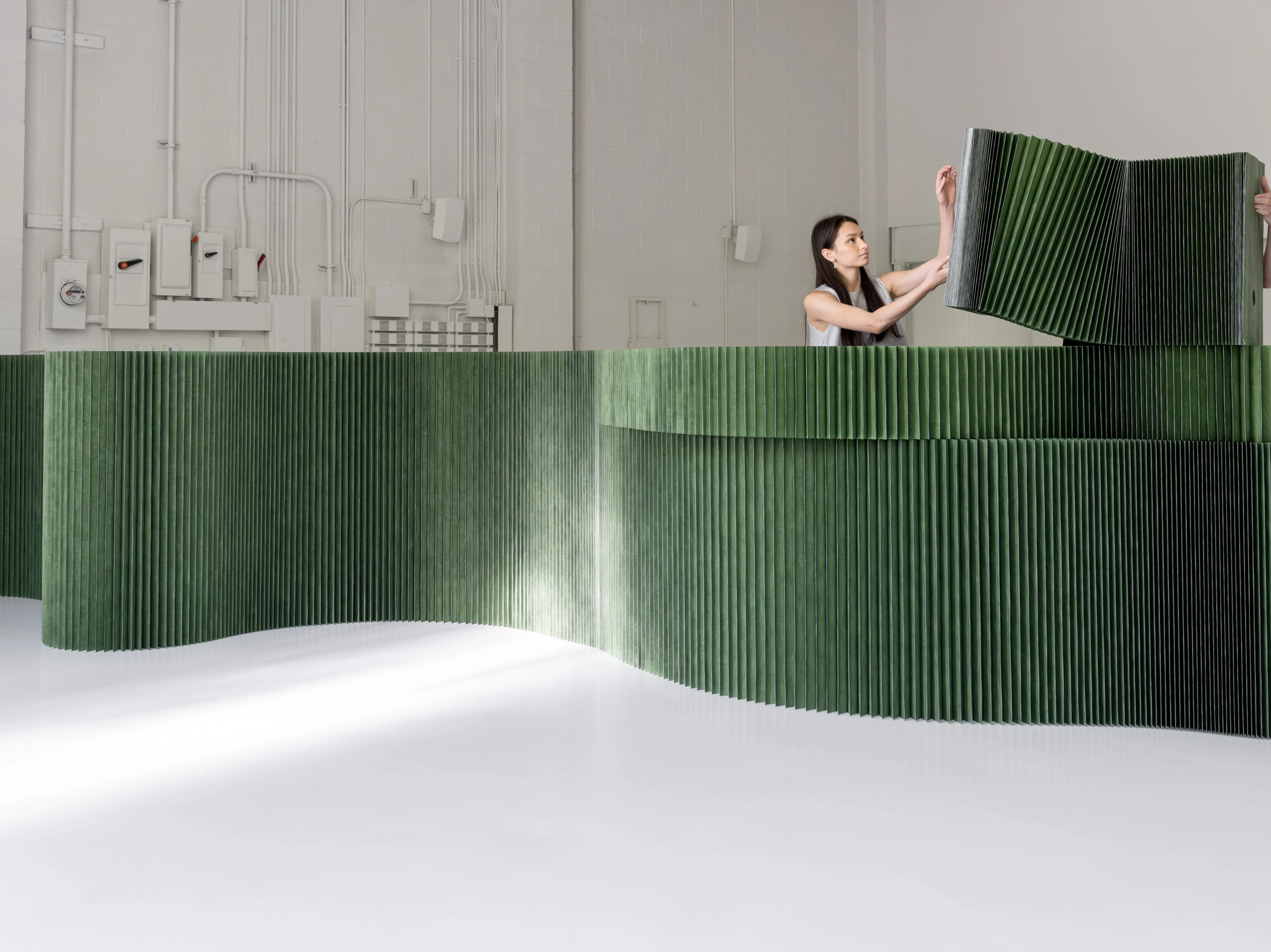 Modular magnetic end panels allow different heights to connect seamlessly, offering further potential for layering and texture.