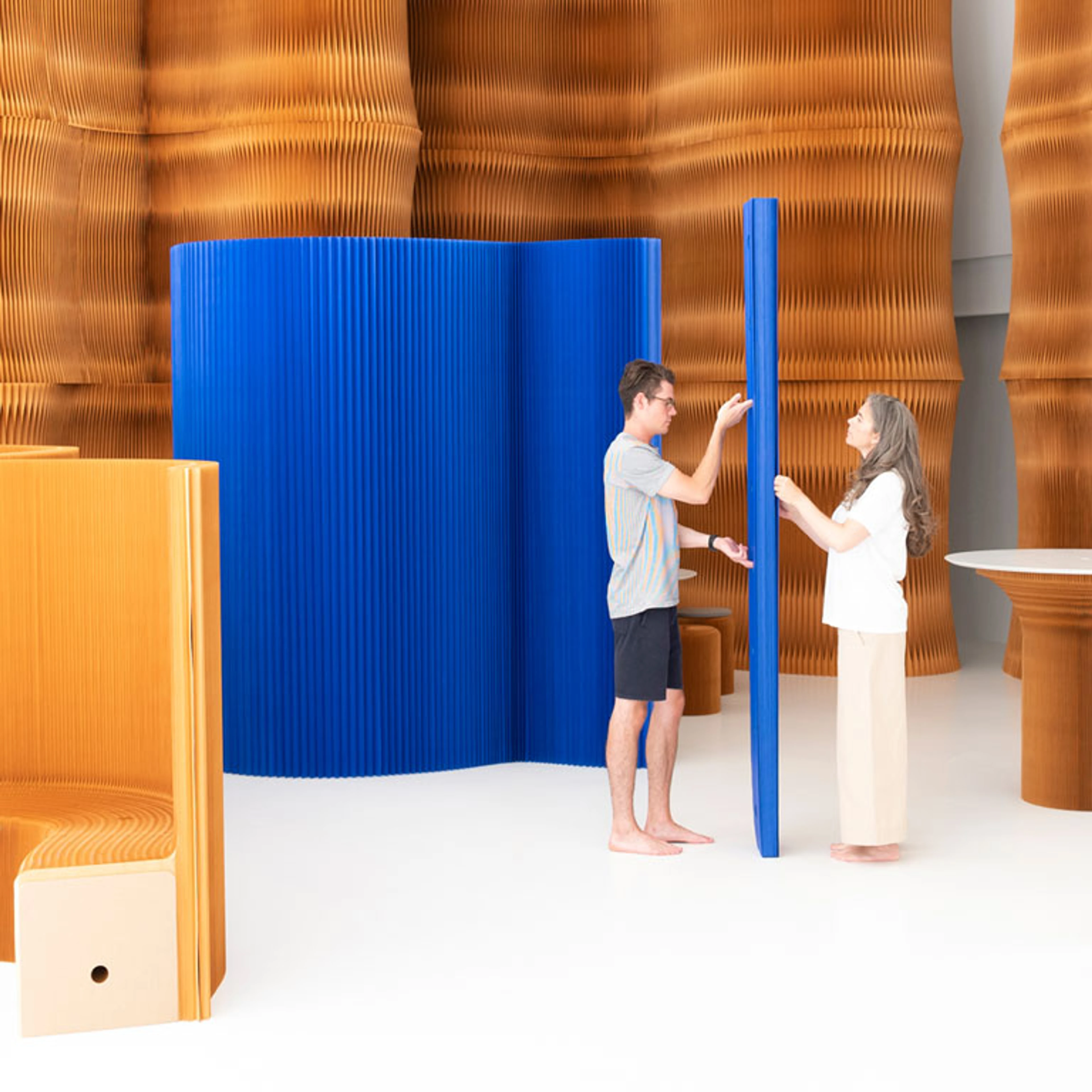 Mobile Acoustic Wall Partitions by molo | blue and brown colours