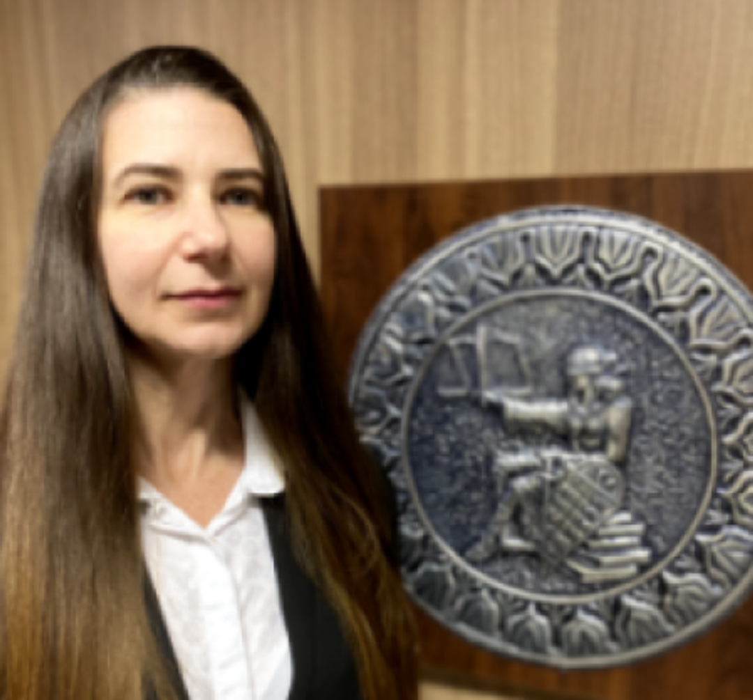 Imagem da Dra. Juliane Trevisan Marco.