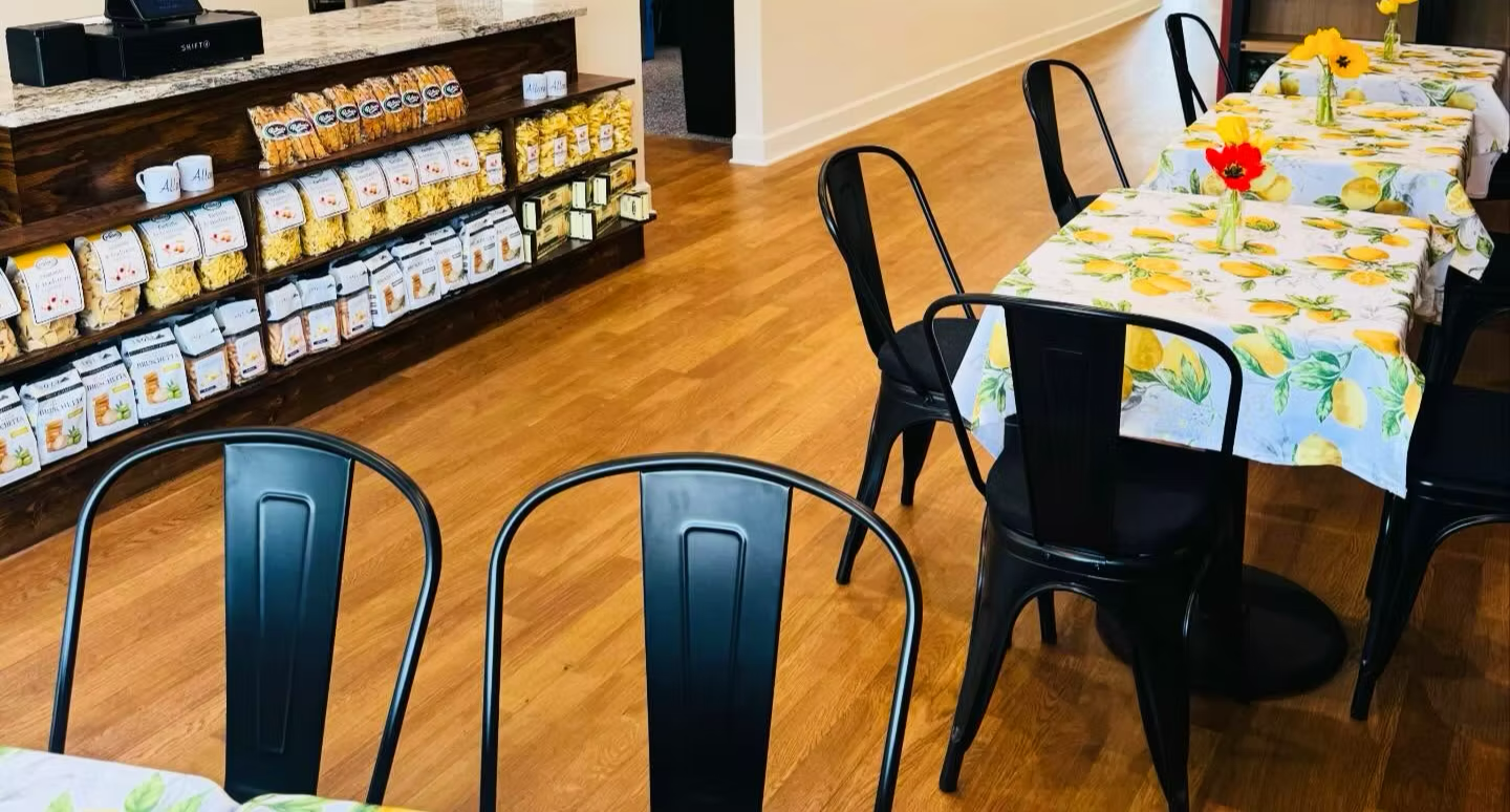 Pelago Cafe dining tables and Italian retail shelves