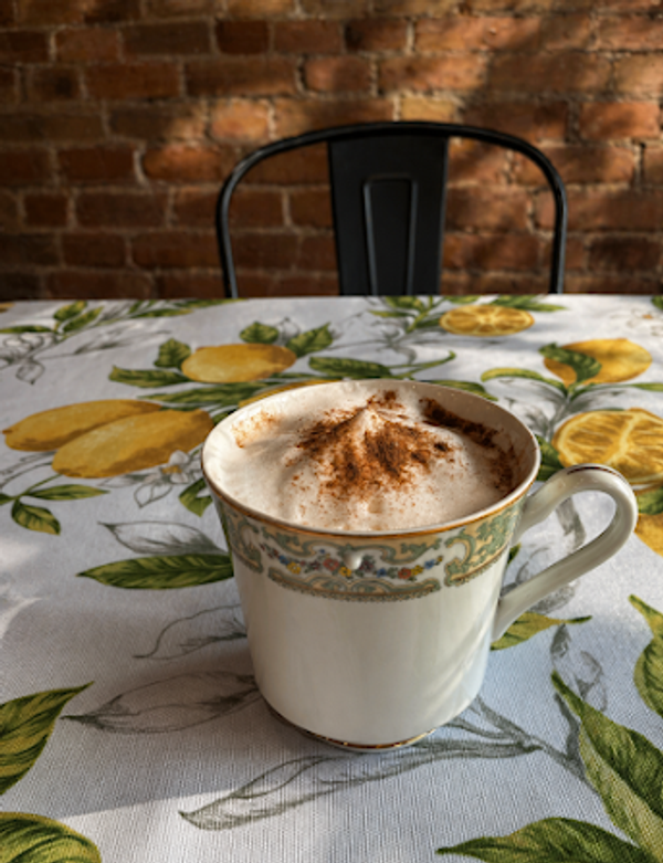 Cappuccino in a decorative cup at Pelago Cafe