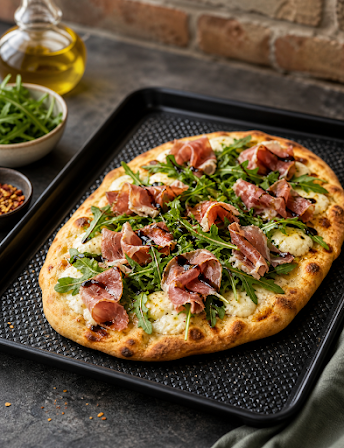 Prosciutto flattini topped with burrata and arugula