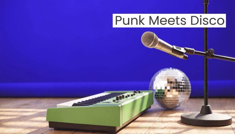 A green synthesizer and a disco ball on a wooden floor with a microphone on a stand.