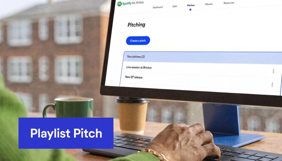 A person working at a computer screen showing the Spotify for Artists pitching dashboard interface.