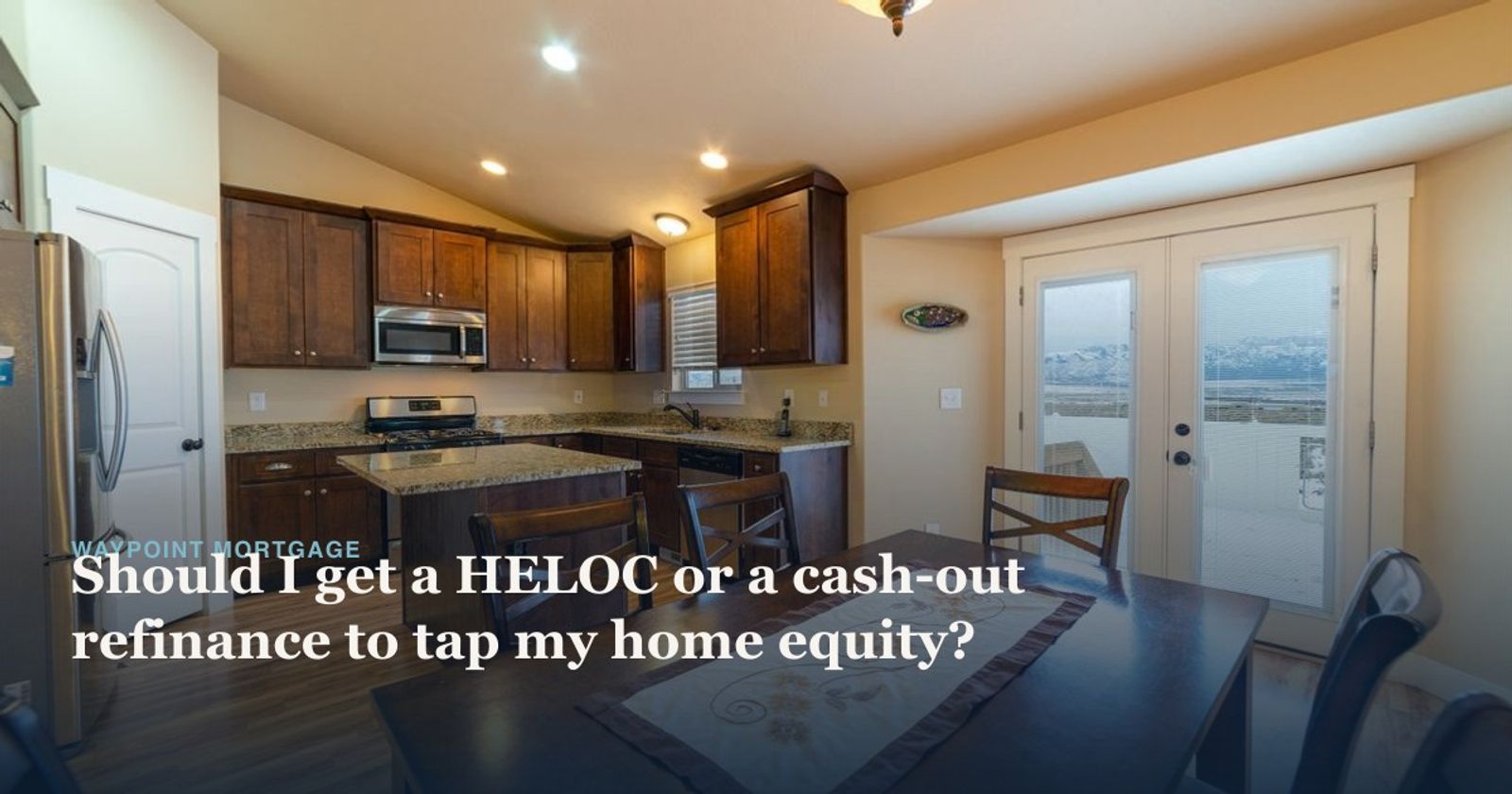 Spacious kitchen and dining area featuring modern appliances and wooden cabinets.