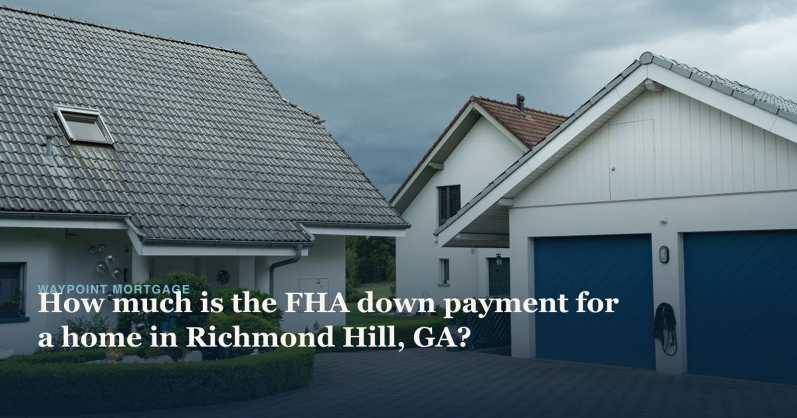 Lovely suburban houses with blue garage doors under cloudy sky, surrounded by greenery.