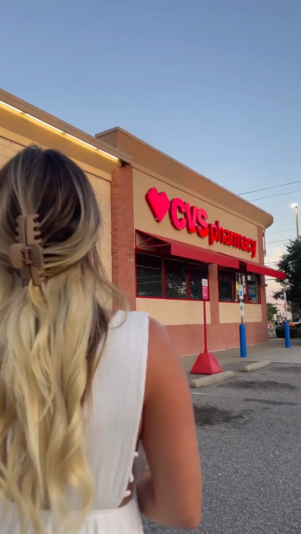 Video thumbnail of a woman walking into CVS