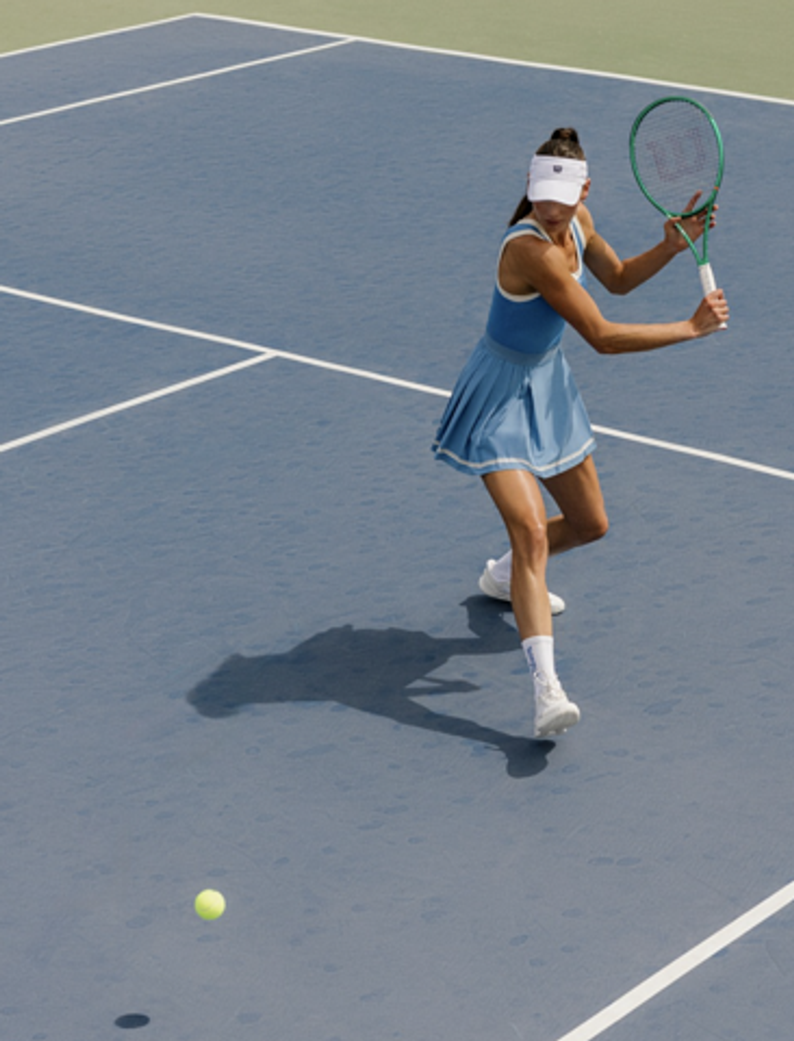 Tennis player with a Wilson racket.