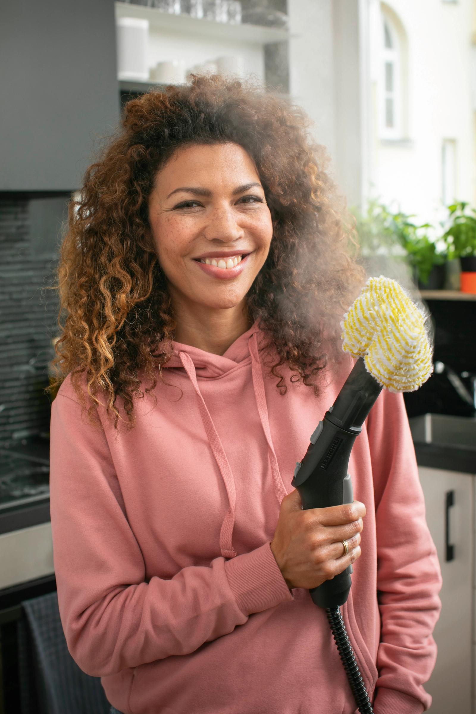 Woman using Kärcher cleaning products