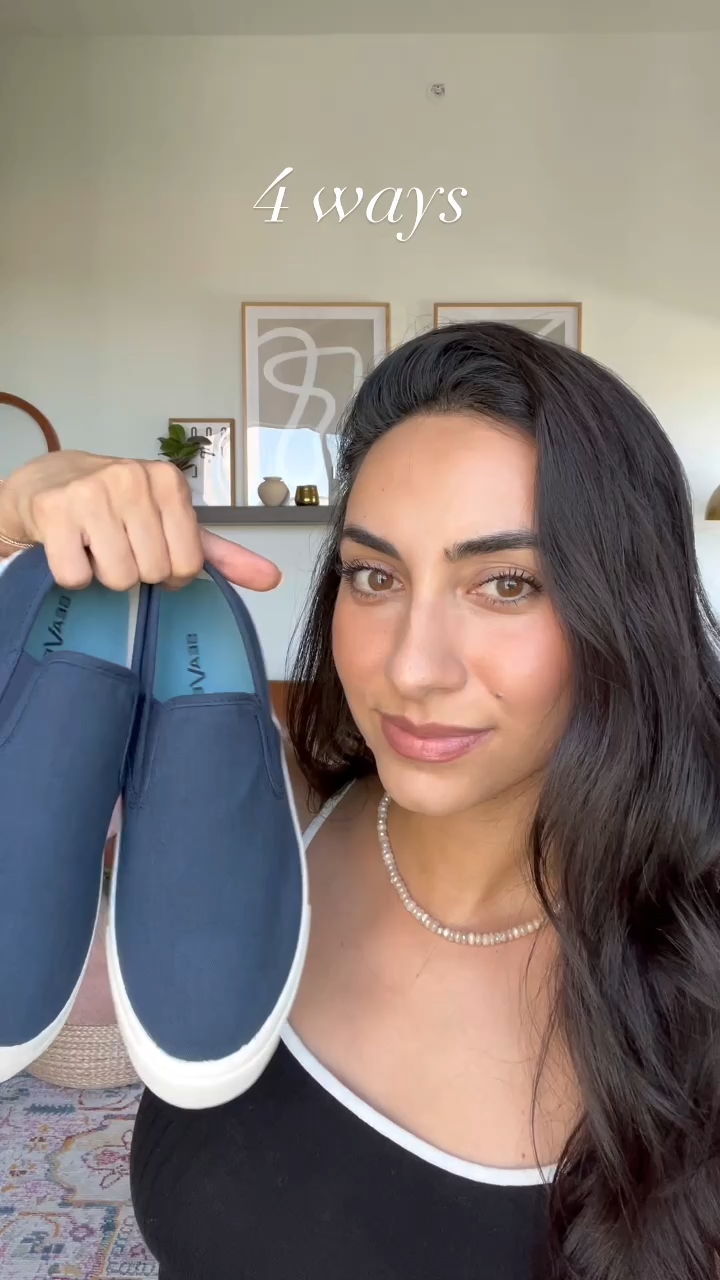 Video thumbnail of a woman holding shoes