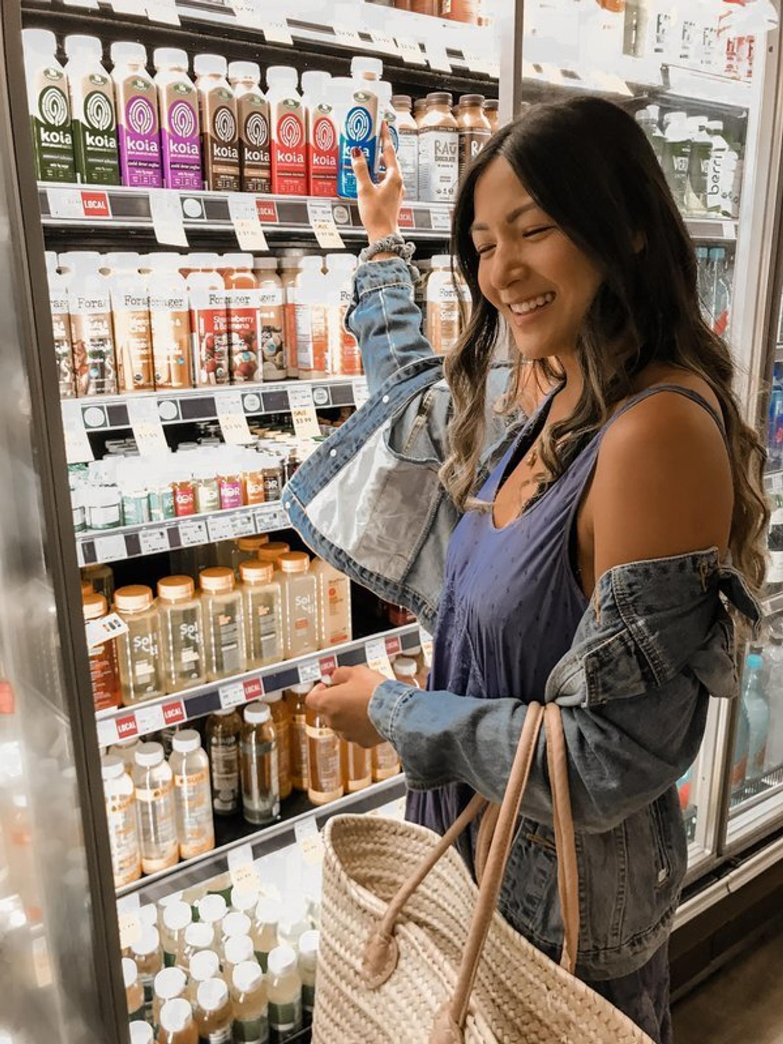 Photo of woman shopping at store for Koia
