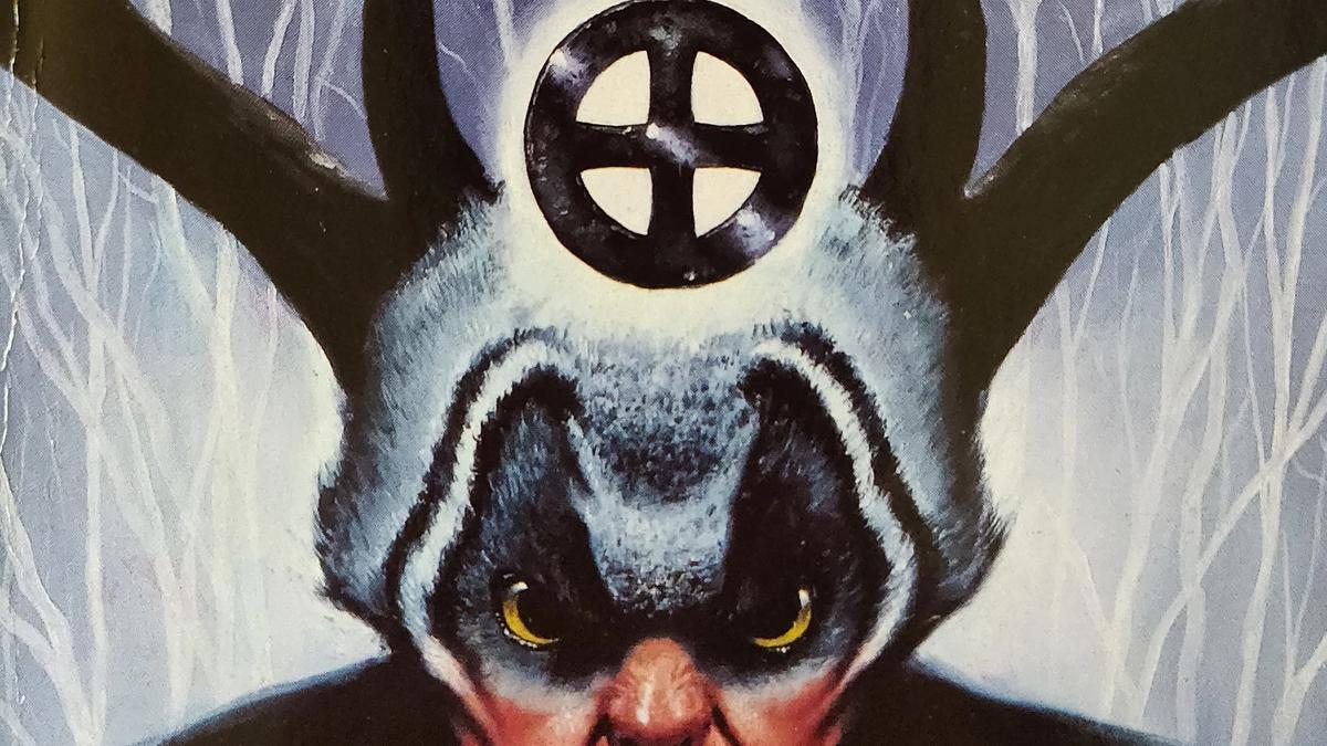 Cover detail of The Dark is Rising by Susan Cooper showing a painting of Herne the Hunter