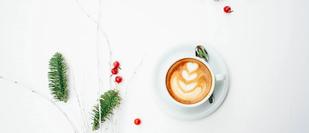 Photo by Toa Heftiba on Unsplash showing a coffee cup on a white background