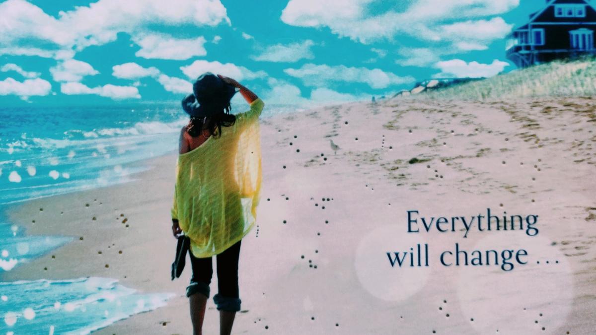 Cover detail of The Summer Without You by Karen Swan showing a woman in yellow walking on a beach